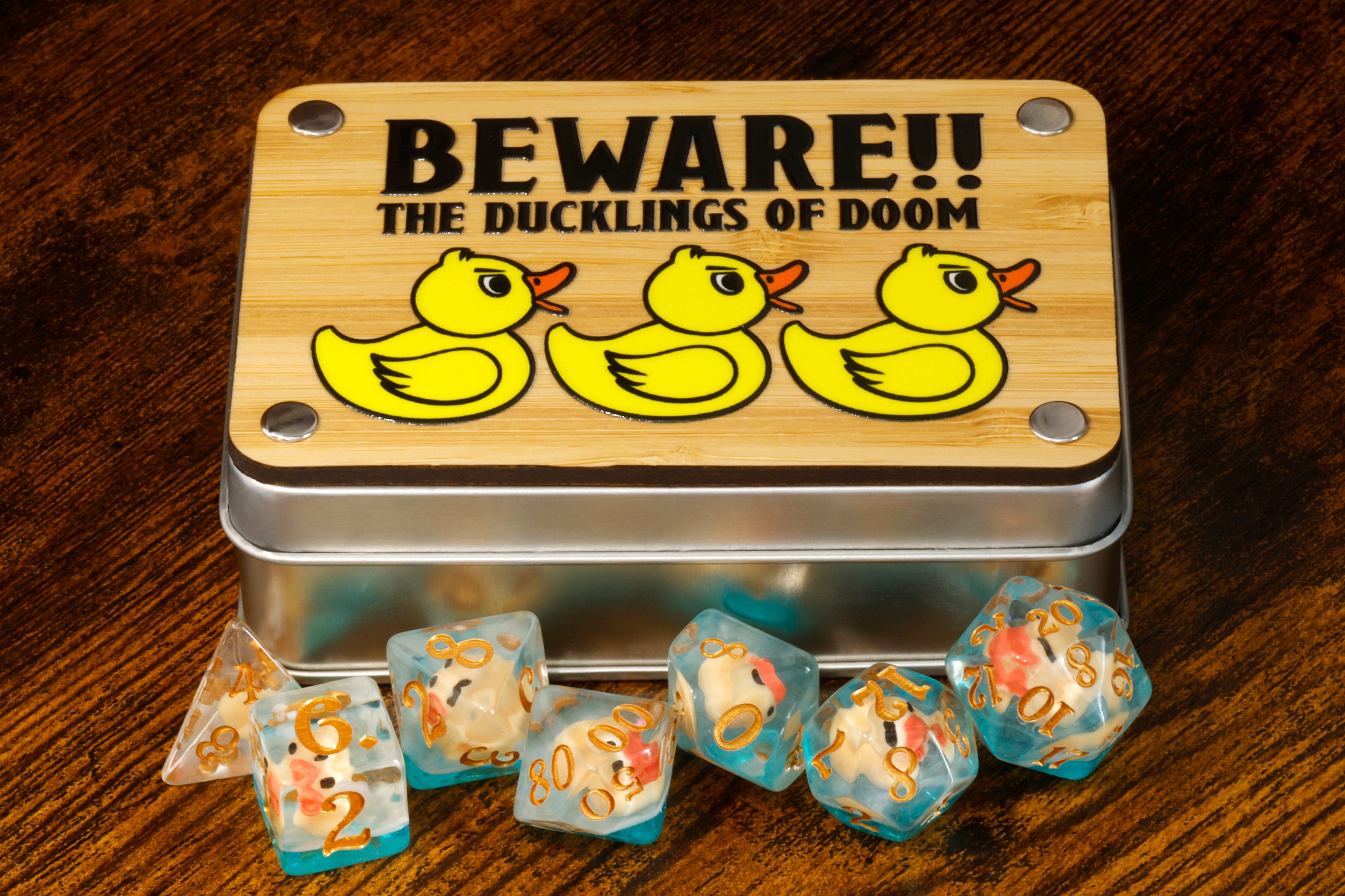 a tin of dices with rubber ducks on them