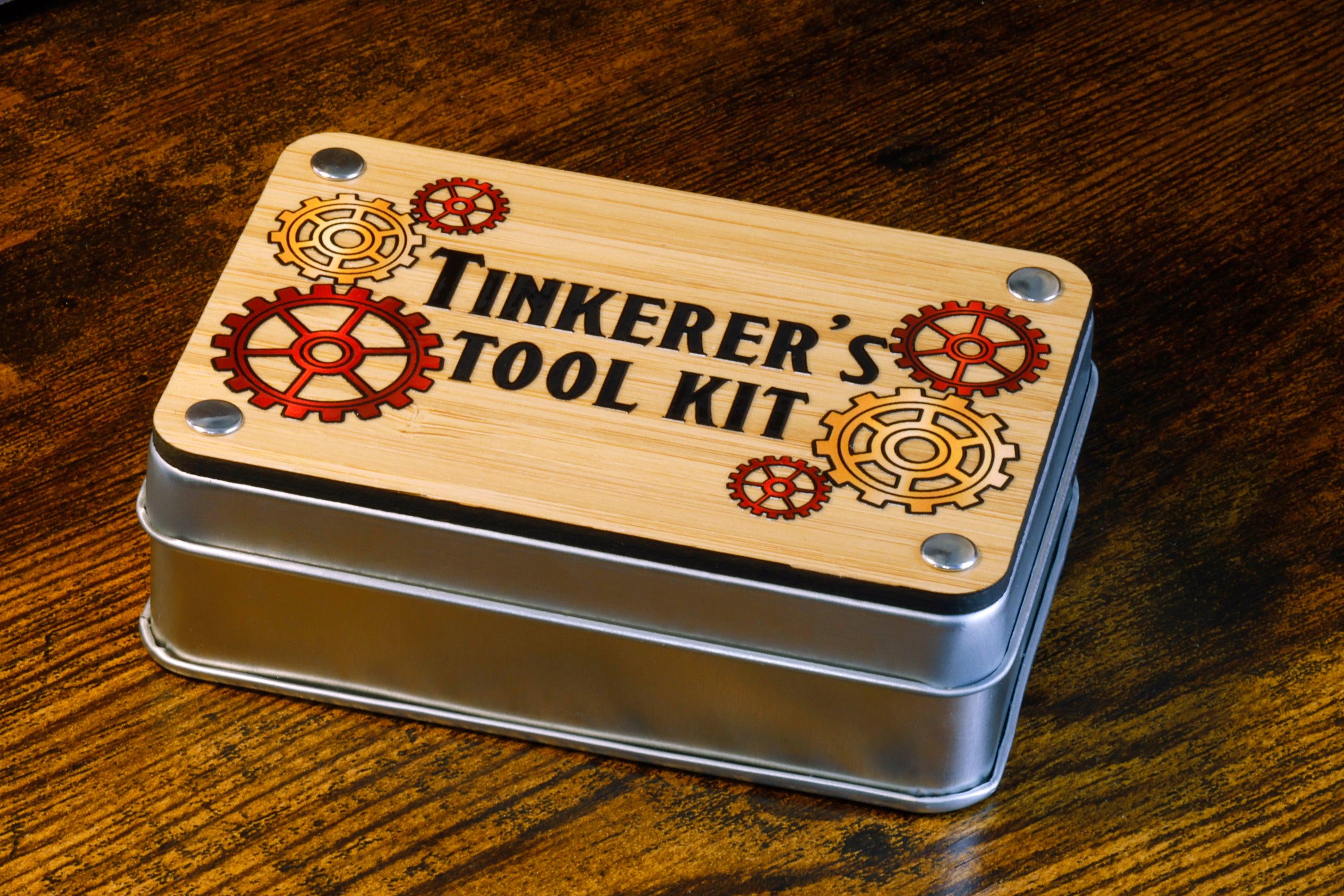 a tinker's tool kit on a wooden table