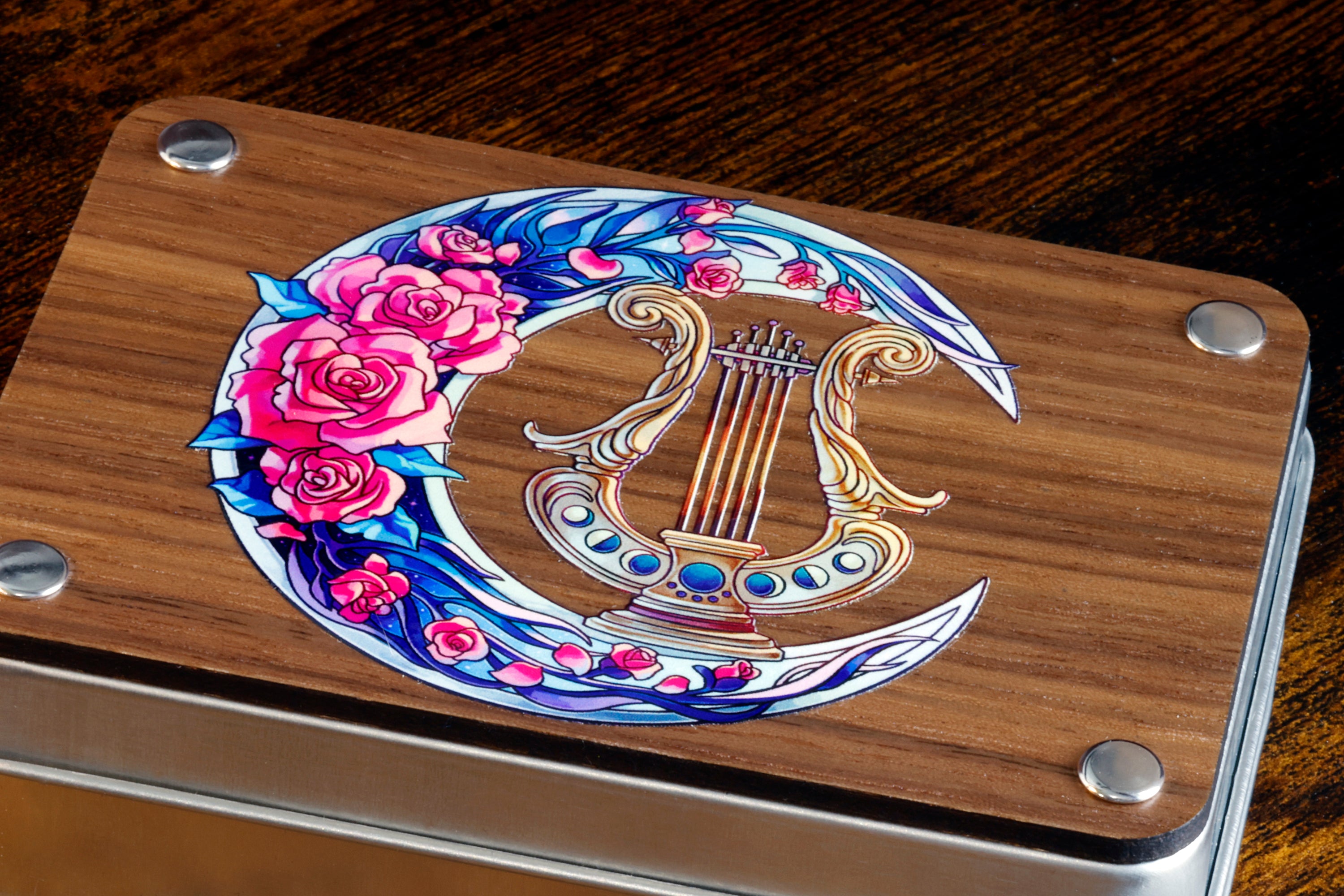 a wooden box with a musical instrument painted on it